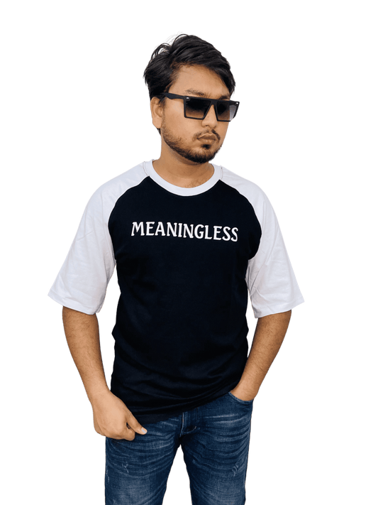 Black 'MEANINGLESS' raglan tee on model - essential oversized streetwear staple | Bangladesh wholesale