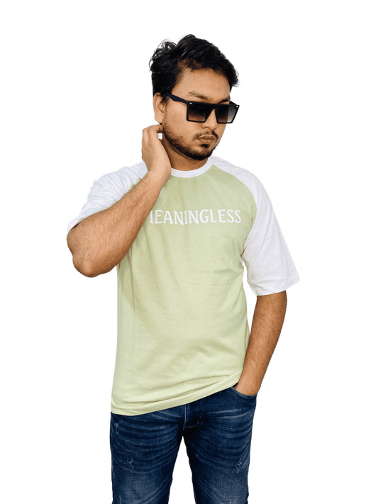 Frog-green 'MEANINGLESS' raglan tee on model - bold oversized streetwear with contrast sleeves | Bangladesh wholesale