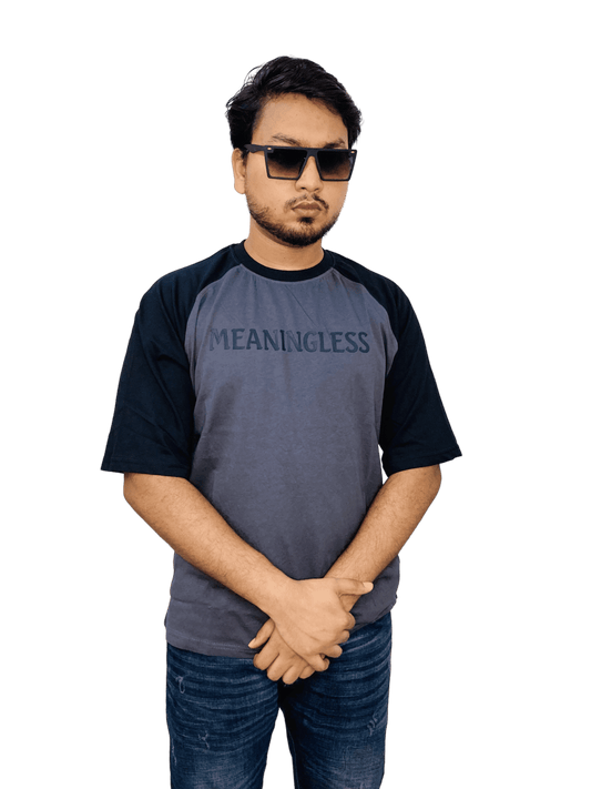 Gray 'MEANINGLESS' raglan t-shirt on model - urban oversized fit with contrast sleeves | Bangladesh bulk supplier