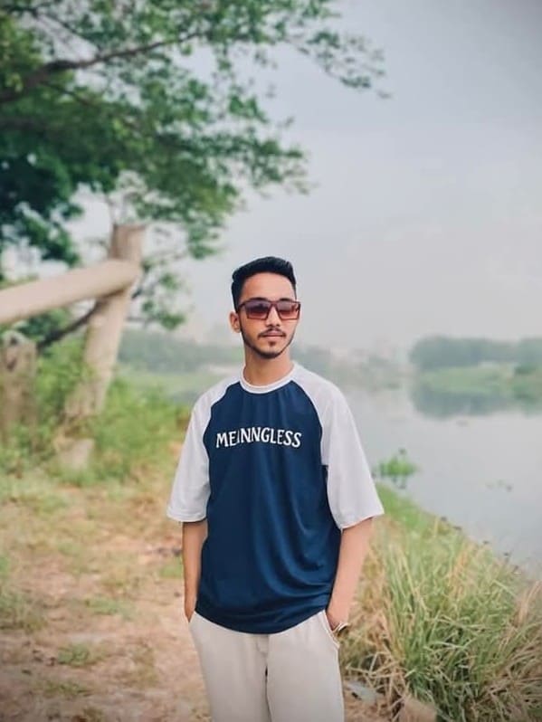 Customer Review picture beside a river with our raglan drop shoulder tee navy